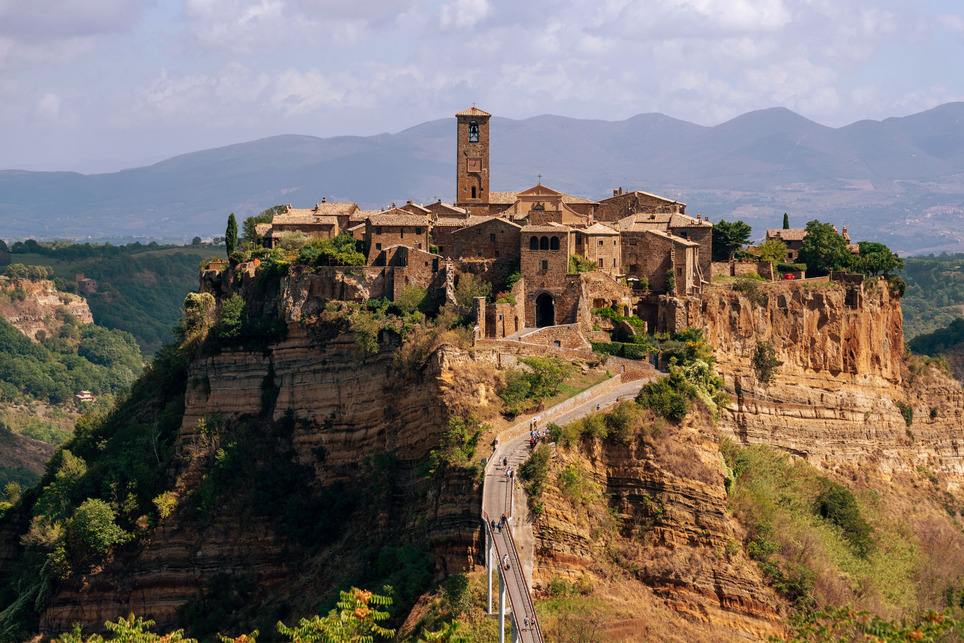 View of the historic Civita di Bagnoregio from above the bridge leading over the valley into town.