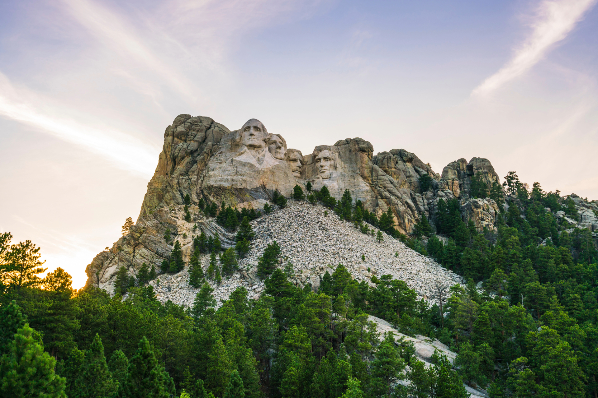 A mesmerizing view of Mount Rushmore National Memorial surrounded by the Black Hills.